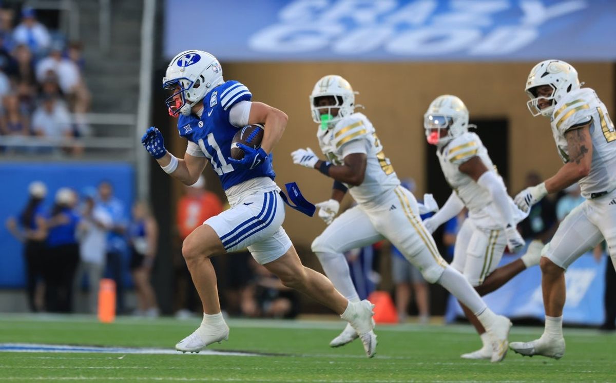 Dec 27, 2025; Orlando, FL, USA; BYU Cougars wide receiver Parker Kingston (11) runs with the back against the Georgia Tech Yellow Jackets during the first half at Camping World Stadium. Mandatory Credit: Kim Klement Neitzel-Imagn Images