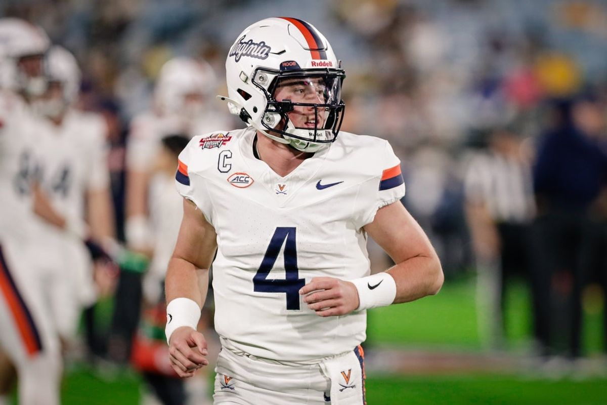 Dec 27, 2025; Jacksonville, FL, USA; Virginia Cavaliers quarterback Chandler Morris (4) warms up before the Gator Bowl against the Missouri Tigers at EverBank Stadium. Mandatory Credit: Travis Register-Imagn Images