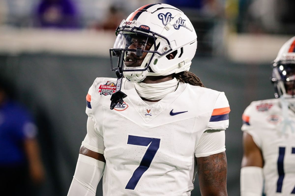 Dec 27, 2025; Jacksonville, FL, USA; Virginia Cavaliers wide receiver Jahmal Edrine (7) warms up before the Gator Bowl against the Missouri Tigers at EverBank Stadium. Mandatory Credit: Travis Register-Imagn Images