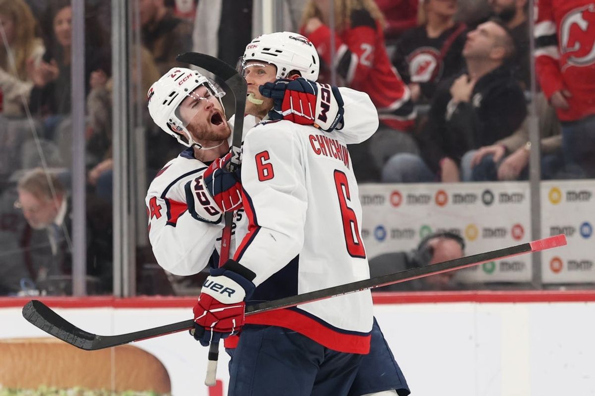 Dec 27, 2025; Newark, New Jersey, USA; Washington Capitals defenseman Jakob Chychrun (6) celebrates his game winning goal against the New Jersey Devils in overtime at Prudential Center. Mandatory Credit: Ed Mulholland-Imagn Images