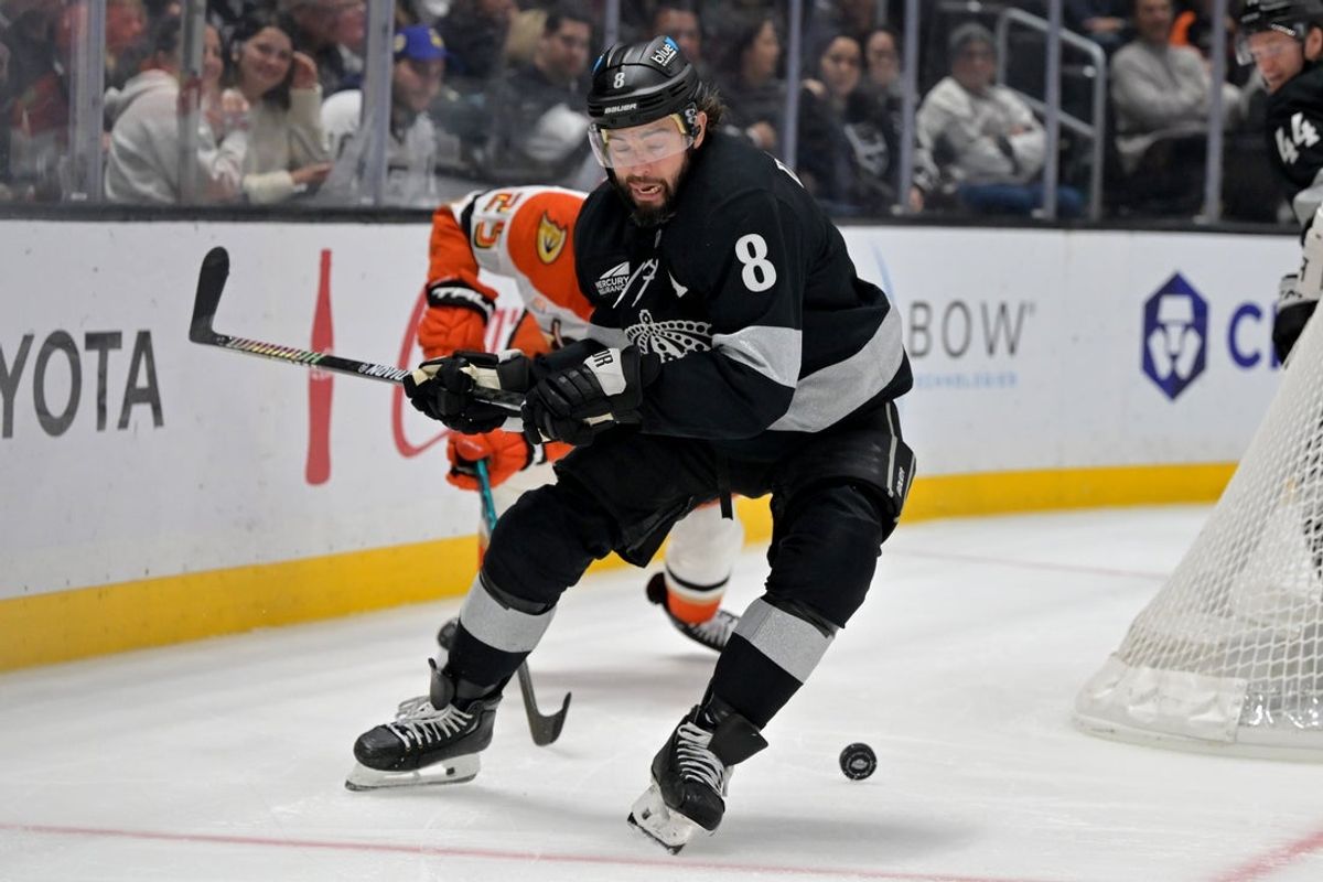 Dec 27, 2025; Los Angeles, California, USA; Los Angeles Kings defenseman Drew Doughty (8) chases down the puck in the third period against the Anaheim Ducks at Crypto.com Arena. Mandatory Credit: Jayne Kamin-Oncea-Imagn Images