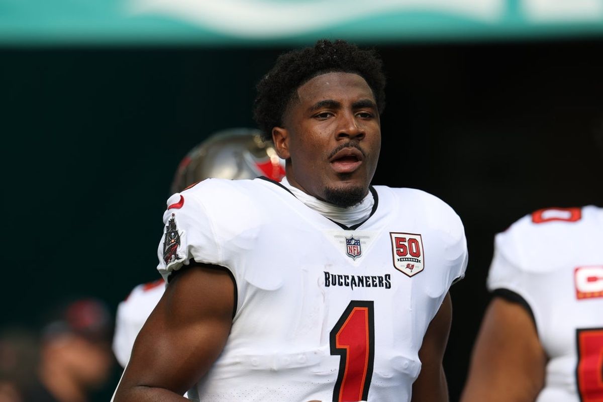 Dec 28, 2025; Miami Gardens, Florida, USA; Tampa Bay Buccaneers running back Rachaad White (1) runs out for player introductions prior to a game against the Miami Dolphins at Hard Rock Stadium. Mandatory Credit: Nathan Ray Seebeck-Imagn Images