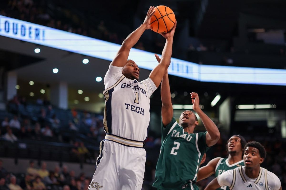 Dec 28, 2025; Atlanta, Georgia, USA; Georgia Tech Yellow Jackets guard Lamar Washington (1) grabs a rebound against the Florida A&M Rattlers in the first half at McCamish Pavilion. Mandatory Credit: Brett Davis-Imagn Images
