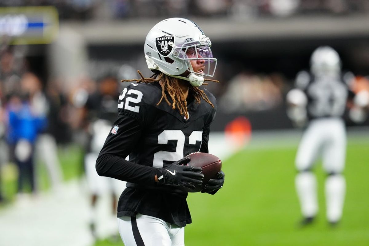 Dec 28, 2025; Paradise, Nevada, USA; Las Vegas Raiders cornerback Eric Stokes (22) warms up before the game against the New York Giants at Allegiant Stadium. Mandatory Credit: Stephen R. Sylvanie-Imagn Images