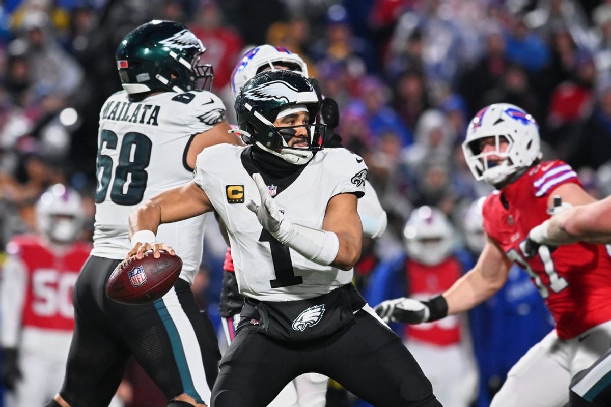 Dec 28, 2025; Orchard Park, New York, USA; Philadelphia Eagles quarterback Jalen Hurts (1) throws a pass against the Buffalo Bills during the second quarter at Highmark Stadium. Mandatory Credit: Mark Konezny-Imagn Images