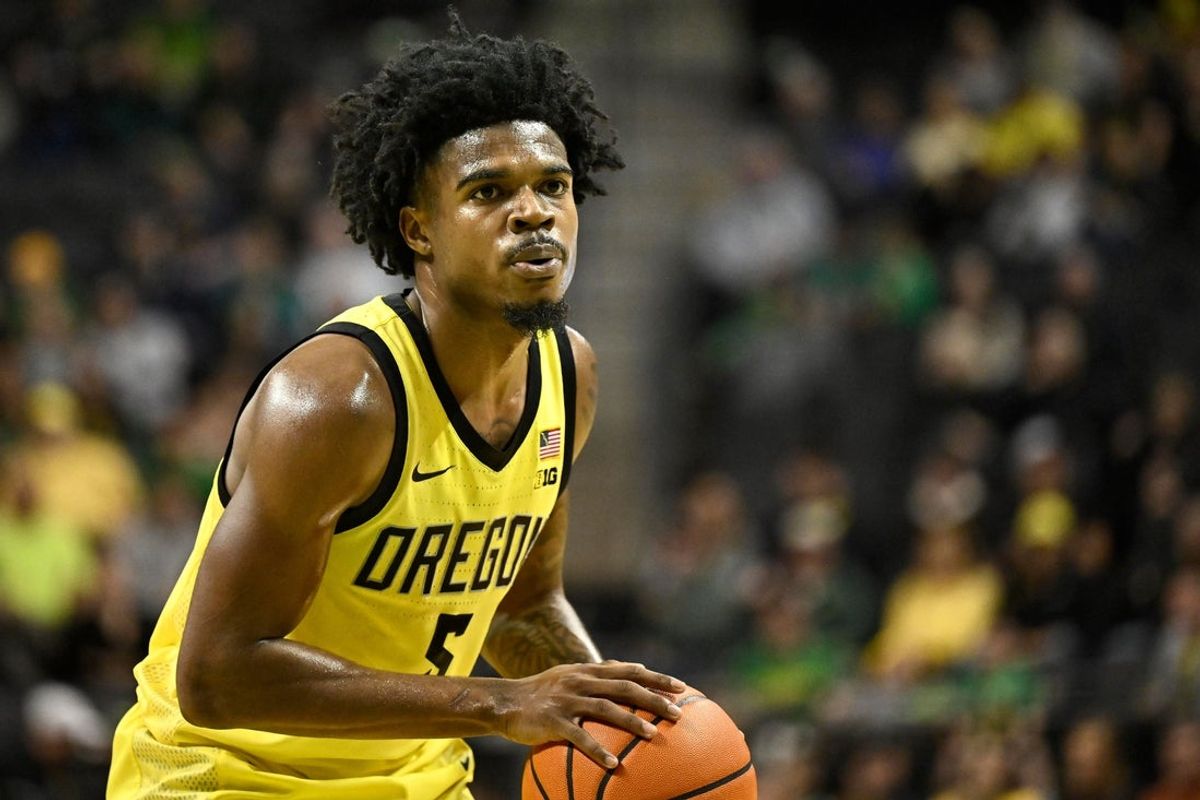Dec 28, 2025; Eugene, Oregon, USA; Oregon Ducks guard Takai Simpkins (5) looks to pass the ball during the first half against the Omaha Mavericks at Matthew Knight Arena. Mandatory Credit: Craig Strobeck-Imagn Images