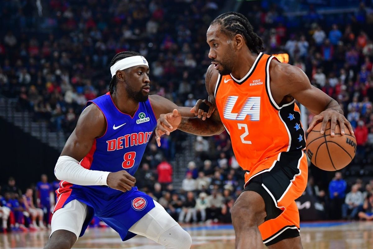 Dec 28, 2025; Inglewood, California, USA; Los Angeles Clippers forward Kawhi Leonard (2) moves the ball against Detroit Pistons guard Caris Levert (8) during the first half at Intuit Dome. Mandatory Credit: Gary A. Vasquez-Imagn Images