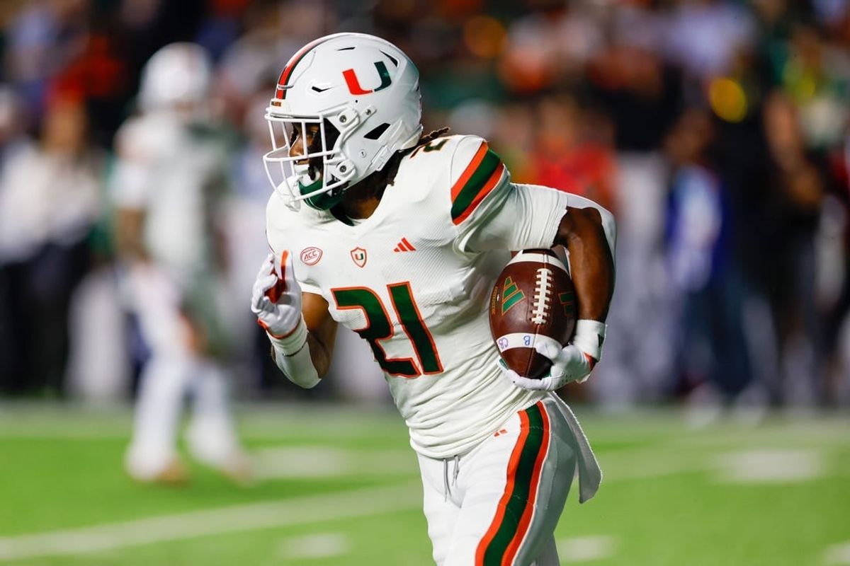 Oct 14, 2023; Chapel Hill, North Carolina, USA; Miami Hurricanes running back Henry Parrish Jr. (21) carries the football against the North Carolina Tar Heels in the first half at Kenan Memorial Stadium.