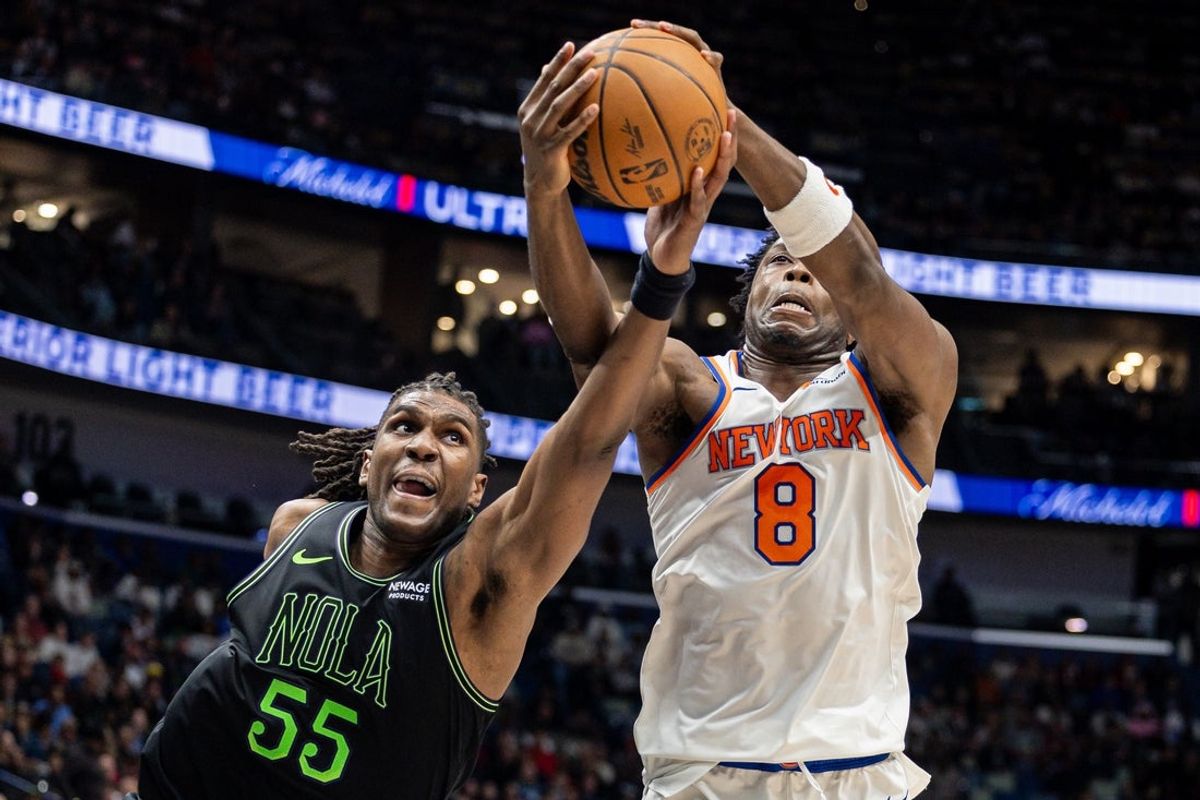 Dec 29, 2025; New Orleans, Louisiana, USA;  h545 goes for a steal against New York Knicks forward/guard Og Anunoby (8) during the first half at Smoothie King Center. Mandatory Credit: Stephen Lew-Imagn Images