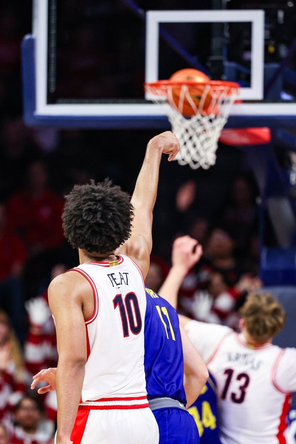 Dec 29, 2025; Tucson, Arizona, USA; Arizona Wildcats forward Koa Peat (10) makes a three-point basket during the first half of the game against the South Dakota State Jackrabbits at McKale Memorial Center. Mandatory Credit: Aryanna Frank-Imagn Images