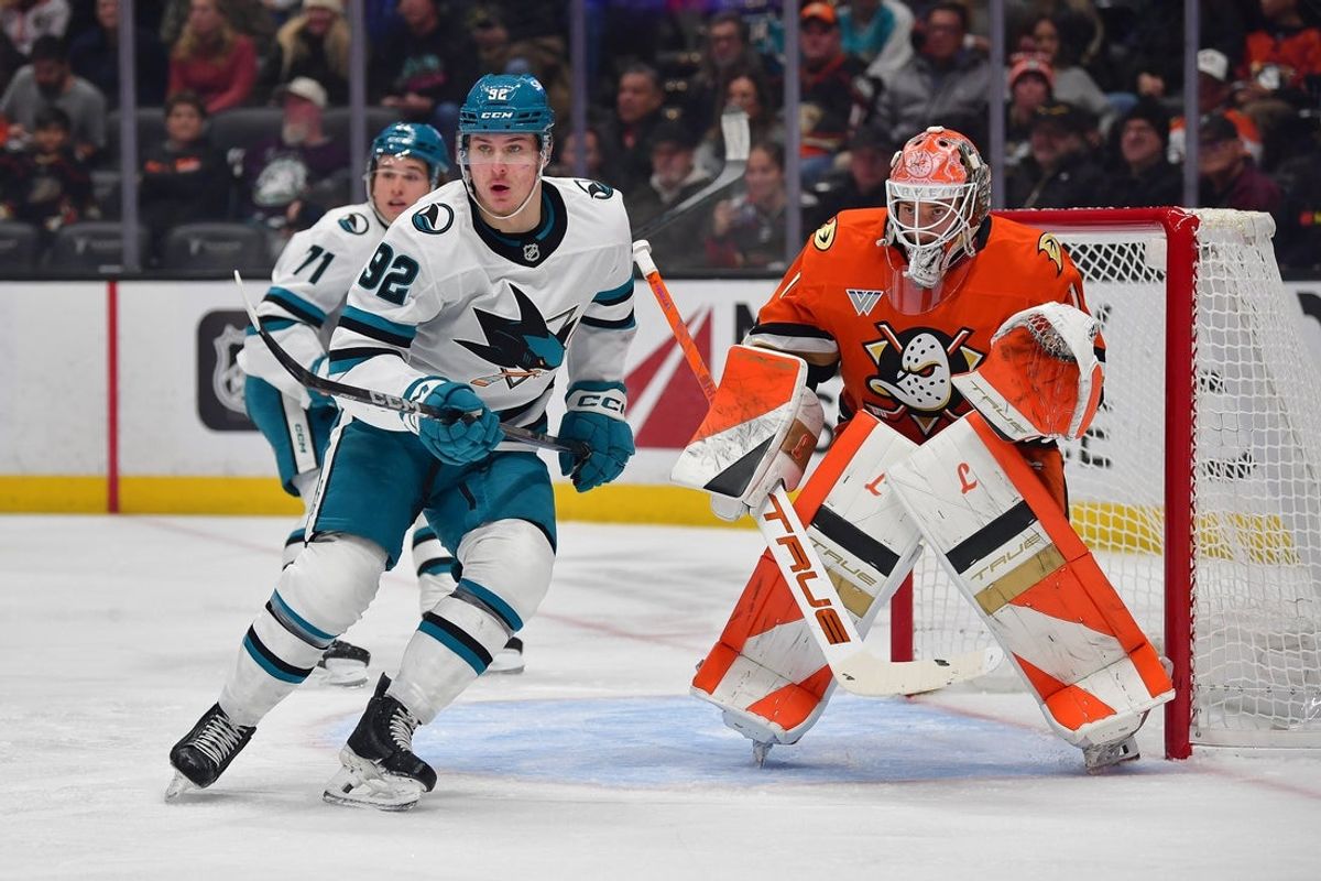 Dec 29, 2025; Anaheim, California, USA; San Jose Sharks left wing Igor Chernyshov (92) in action as Anaheim Ducks goaltender Lukas Dostal (1) defends the goal during the first period at Honda Center. Mandatory Credit: Gary A. Vasquez-Imagn Images