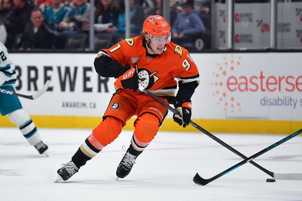 Dec 29, 2025; Anaheim, California, USA; Anaheim Ducks center Leo Carlsson (91) moves the puck against the San Jose Sharks during the second period at Honda Center. Mandatory Credit: Gary A. Vasquez-Imagn Images