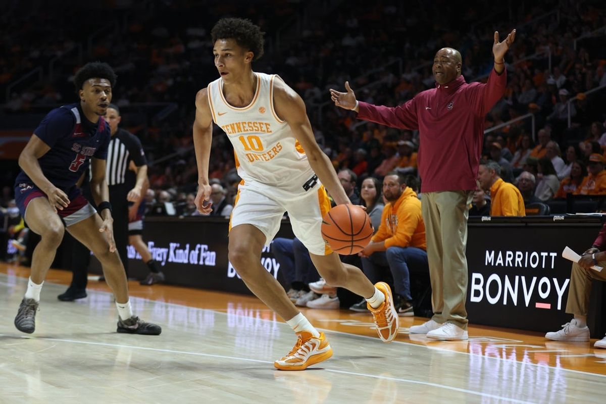 Dec 30, 2025; Knoxville, Tennessee, USA;  Tennessee Volunteers forward Nate Ament (10) moves the ball against the South Carolina State Bulldogs during the first half at Thompson-Boling Arena at Food City Center. Mandatory Credit: Randy Sartin-Imagn Images