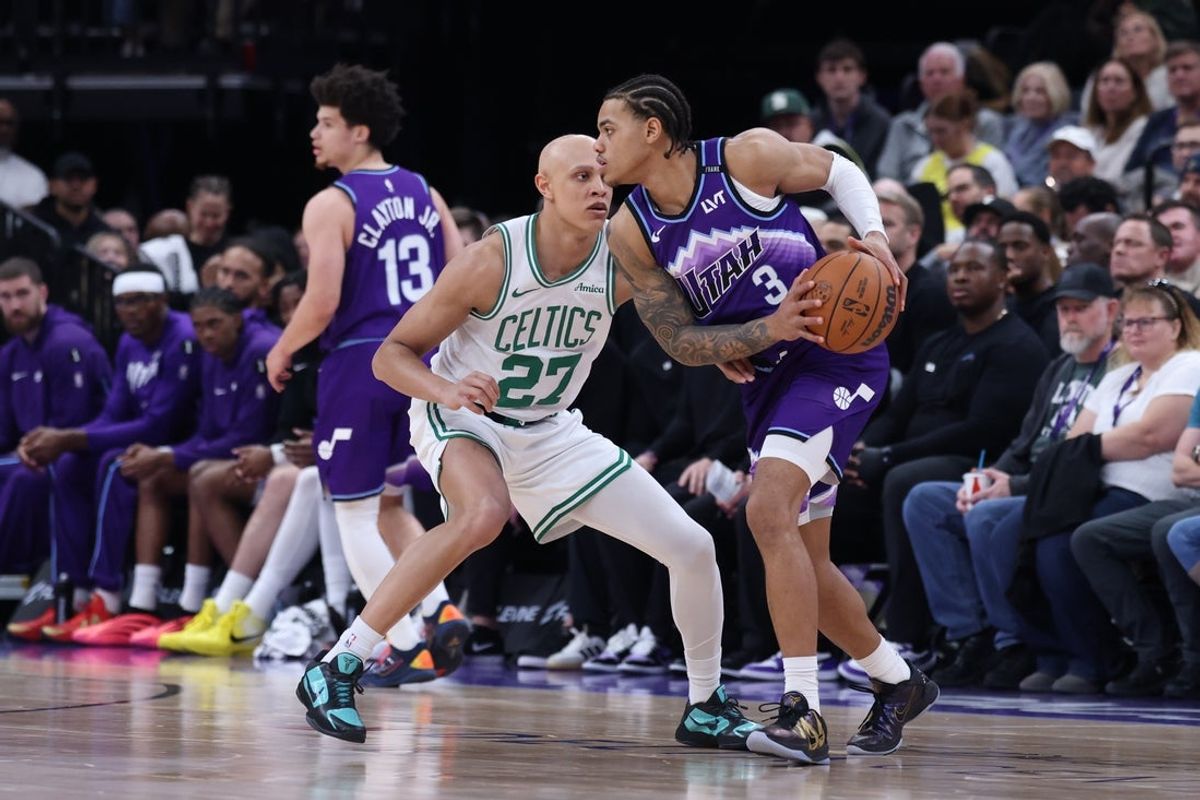 Dec 30, 2025; Salt Lake City, Utah, USA; Utah Jazz guard Keyonte George (3) looks to pass against Boston Celtics guard Jordan Walsh (27) during the first half at Delta Center. Mandatory Credit: Rob Gray-Imagn Images