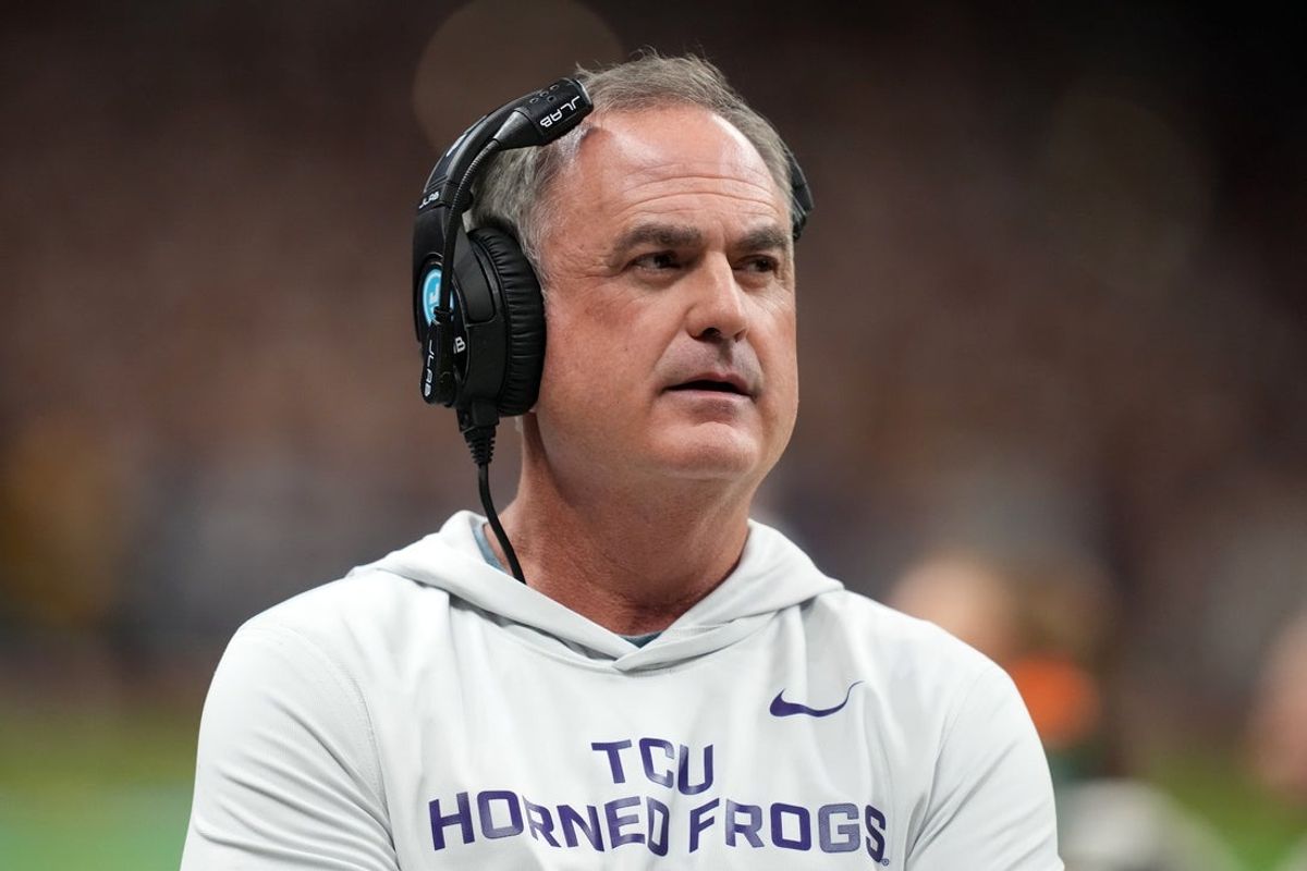 Dec 30, 2025; San Antonio, TX, USA; TCU Horned Frogs head coach Sonny Dykes watches from the sidelines against the Southern California Trojans in the first half during the Alamo Bowl at Alamodome. Mandatory Credit: Kirby Lee-Imagn Images