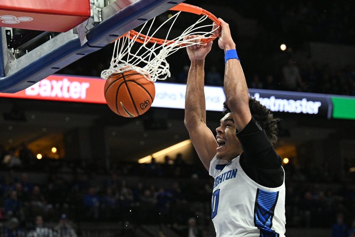 Dec 30, 2025; Omaha, Nebraska, USA; Creighton Bluejays forward Jasen Green (0) dunks against the Butler Bulldogs during the second half at CHI Health Center Omaha. Mandatory Credit: Steven Branscombe-Imagn Images