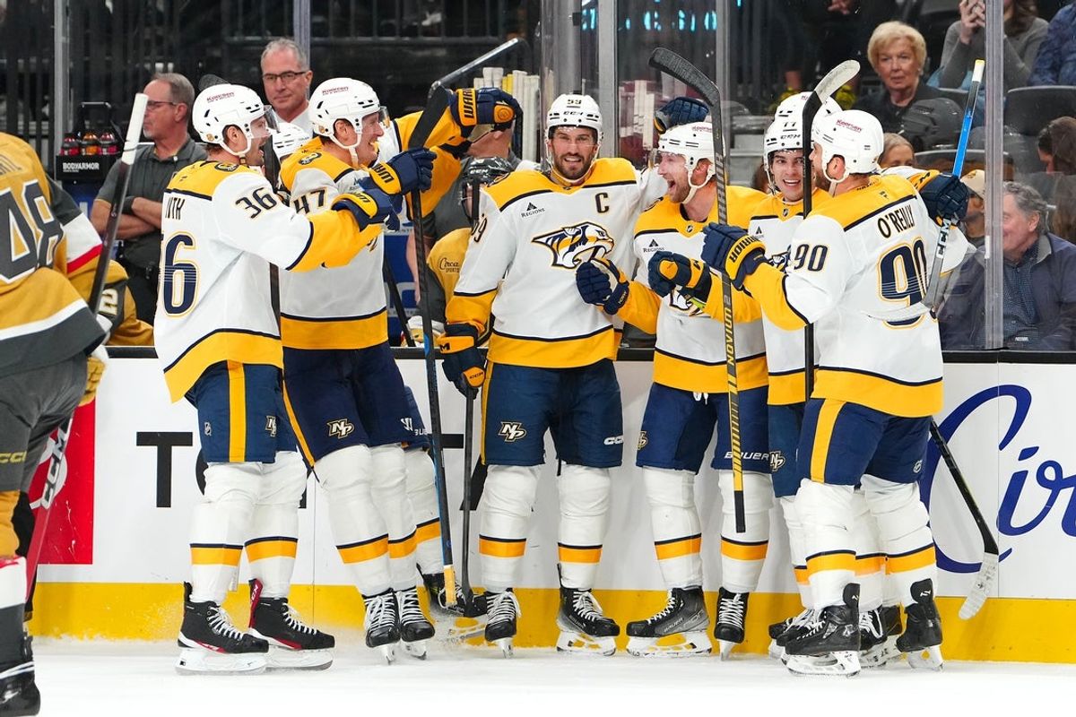 Dec 31, 2025; Las Vegas, Nevada, USA; Nashville Predators center Steven Stamkos (91) celebrates with team mates after scoring a goal against the Vegas Golden Knights during the first period at T-Mobile Arena. The goal was the 600th of his NHL career. Mandatory Credit: Stephen R. Sylvanie-Imagn Images