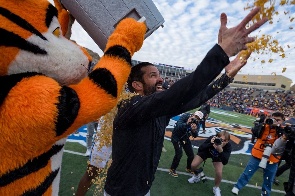 Tony the Tiger dumps Frosted Flakes on Manny Diaz, head football coach at Duke, after a 42-39 win against Arizona State in the Tony the Tiger Sun Bowl at Sun Bowl Stadium in El Paso, Texas, on Wednesday, Dec. 31, 2025.