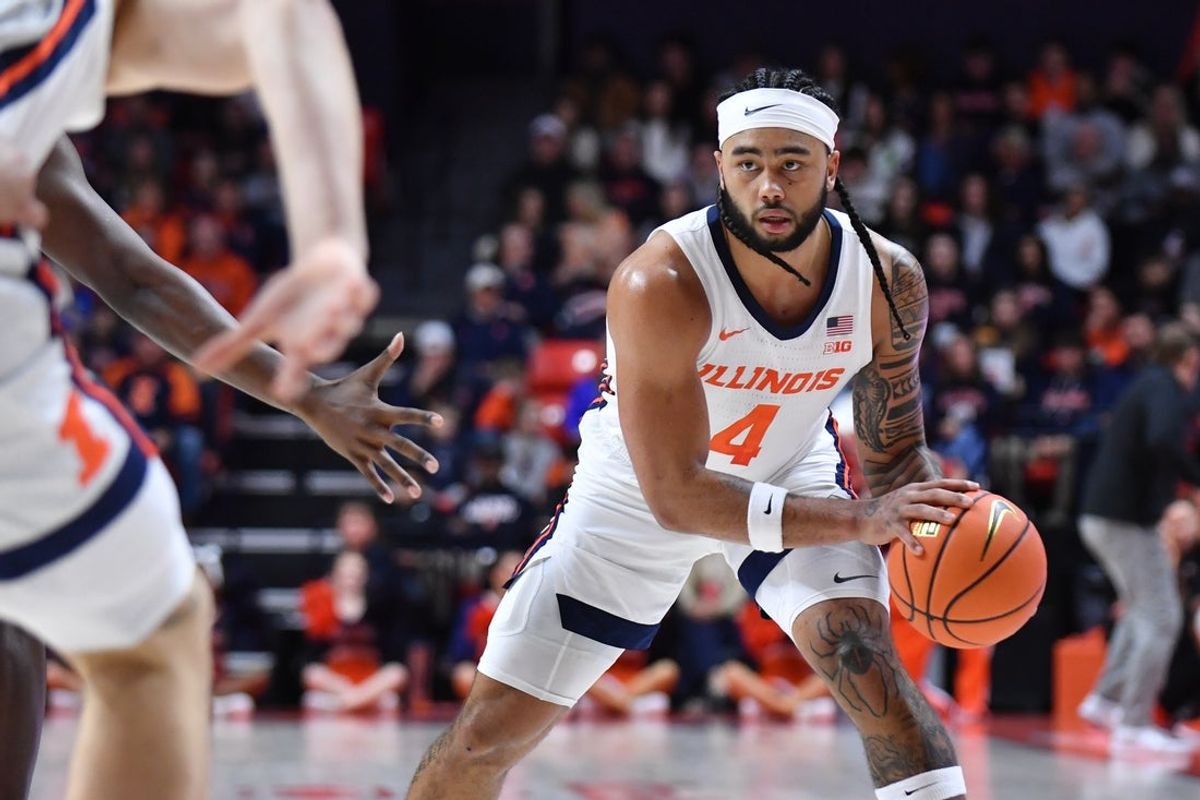 Dec 29, 2025; Champaign, Illinois, USA;  Illinois Fighting Illini guard Kylan Boswell (4) during the first half against the Southern University Jaguars at State Farm Center. Mandatory Credit: Ron Johnson-Imagn Images
