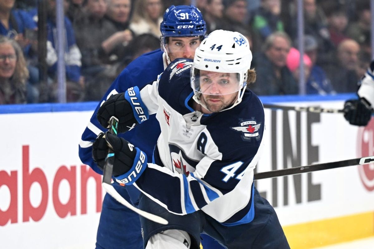 Jan 1, 2026; Toronto, Ontario, CAN;  Winnipeg Jets defenseman Josh Morrissey (44) pursues the play against the Toronto Maple Leafs in the third period at Scotiabank Arena. Mandatory Credit: Dan Hamilton-Imagn Images