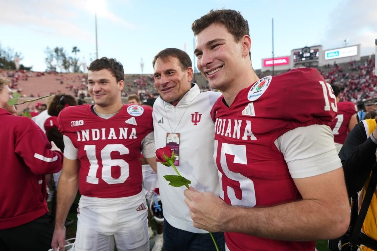 Jan 1, 2026; Pasadena, CA, USA; Indiana Hoosiers quarterback Alberto Mendoza (16), Greg Cambell (center) and quarterback Fernando Mendoza (15) pose after the 2025 Rose Bowl and quarterfinal game of the College Football Playoff against the Alabama Crimson Tide at Rose Bowl Stadium. Mandatory Credit: Kirby Lee-Imagn Images