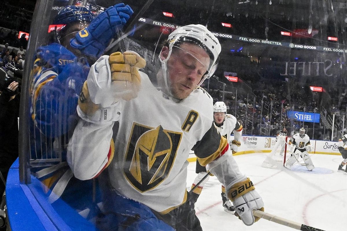 Jan 2, 2026; St. Louis, Missouri, USA; Vegas Golden Knights center Jack Eichel (9) checks St. Louis Blues right wing Jordan Kyrou (25) during the second period at Enterprise Center. Mandatory Credit: Jeff Curry-Imagn Images