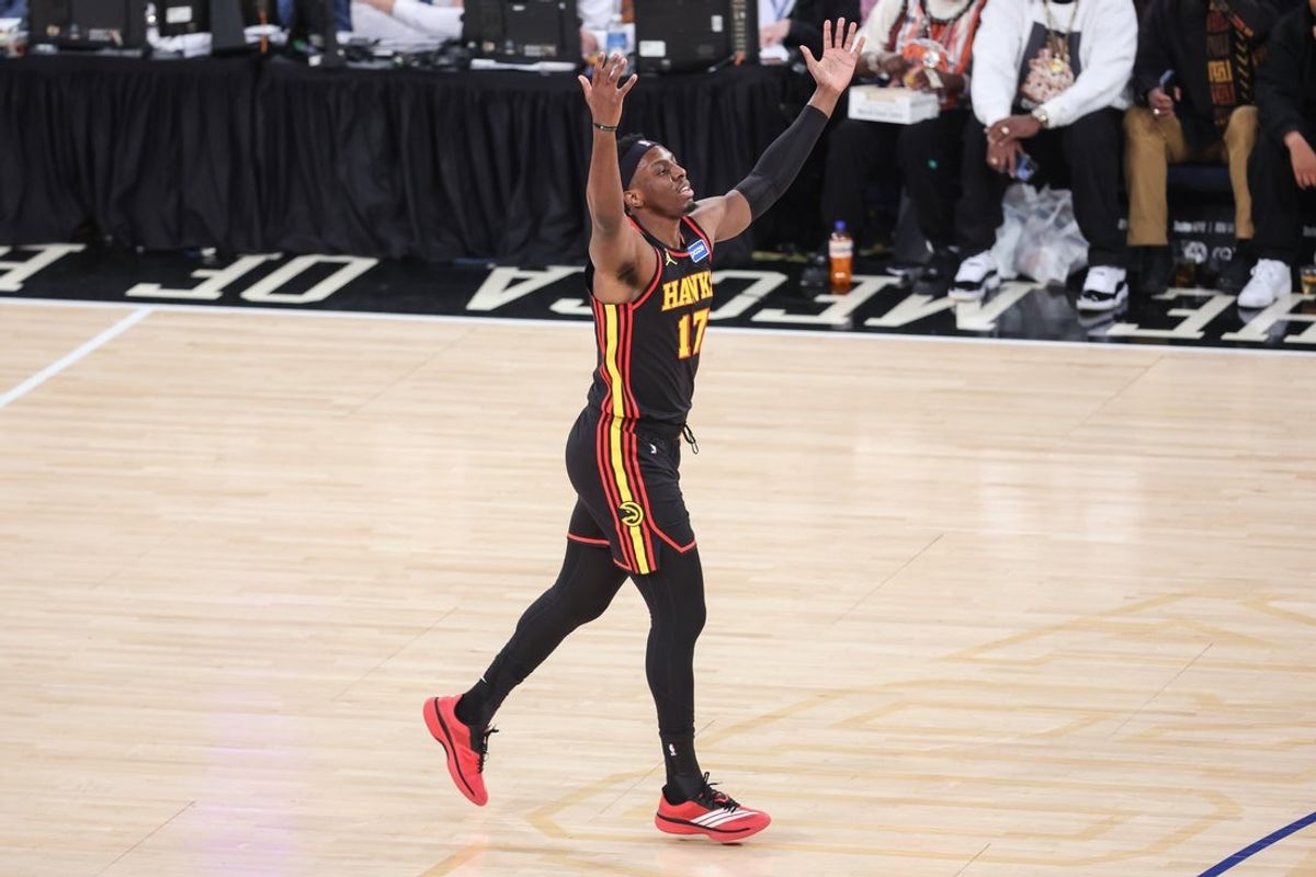 Jan 2, 2026; New York, New York, USA;  Atlanta Hawks forward Onyeka Okongwu (17) celebrates after making a three point shot in the first quarter against the New York Knicks at Madison Square Garden. Mandatory Credit: Wendell Cruz-Imagn Images