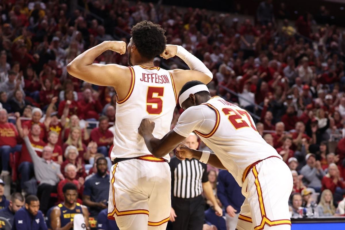 Jan 2, 2026; Ames, Iowa, USA; Iowa State Cyclones forward Joshua Jefferson (5) and Iowa State Cyclones guard Killyan Toure (27) celebrate during the game with the West Virginia Mountaineers during the first half at James H. Hilton Coliseum. Mandatory Credit: Reese Strickland-Imagn Images