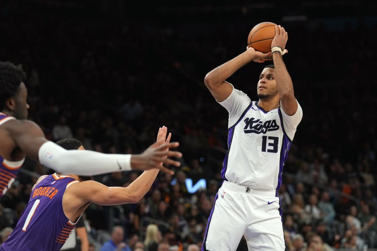 Jan 2, 2026; Phoenix, Arizona, USA; Sacramento Kings forward Keegan Murray (13) shoots against the Phoenix Suns during the second half at Mortgage Matchup Center. Mandatory Credit: Joe Camporeale-Imagn Images