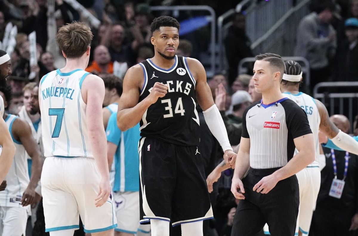 Jan 2, 2026; Milwaukee, Wisconsin, USA; Milwaukee Bucks forward Giannis Antetokounmpo (34) celebrates a 122-121 win over the Charlotte Hornets at Fiserv Forum. Mandatory Credit: Michael McLoone-Imagn Images