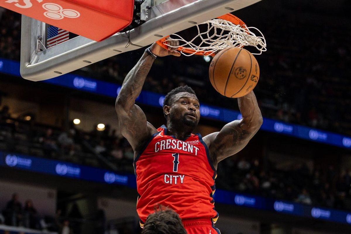 Jan 2, 2026; New Orleans, Louisiana, USA;  New Orleans Pelicans forward Zion Williamson (1) dunks the ball against Portland Trail Blazers forward Deni Avdija (8) during the second half at Smoothie King Center. Mandatory Credit: Stephen Lew-Imagn Images