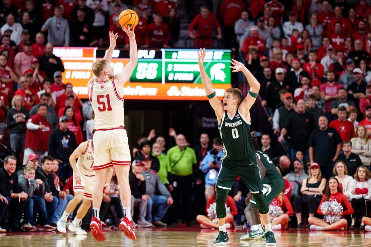 Jan 2, 2026; Lincoln, Nebraska, USA; Nebraska Cornhuskers forward Rienk Mast (51) shoots the ball against Michigan State Spartans forward Jaxon Kohler (0) during the second half at Pinnacle Bank Arena. Mandatory Credit: Dylan Widger-Imagn Images