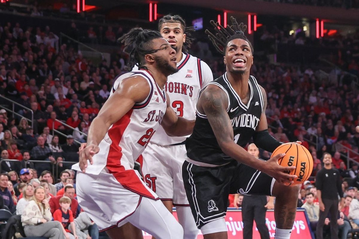 Jan 3, 2026; New York, New York, USA;  Providence Friars guard Jason Edwards (1) looks to drive past St. John's Red Storm forward Zuby Ejiofor (24) in the first half at Madison Square Garden. Mandatory Credit: Wendell Cruz-Imagn Images