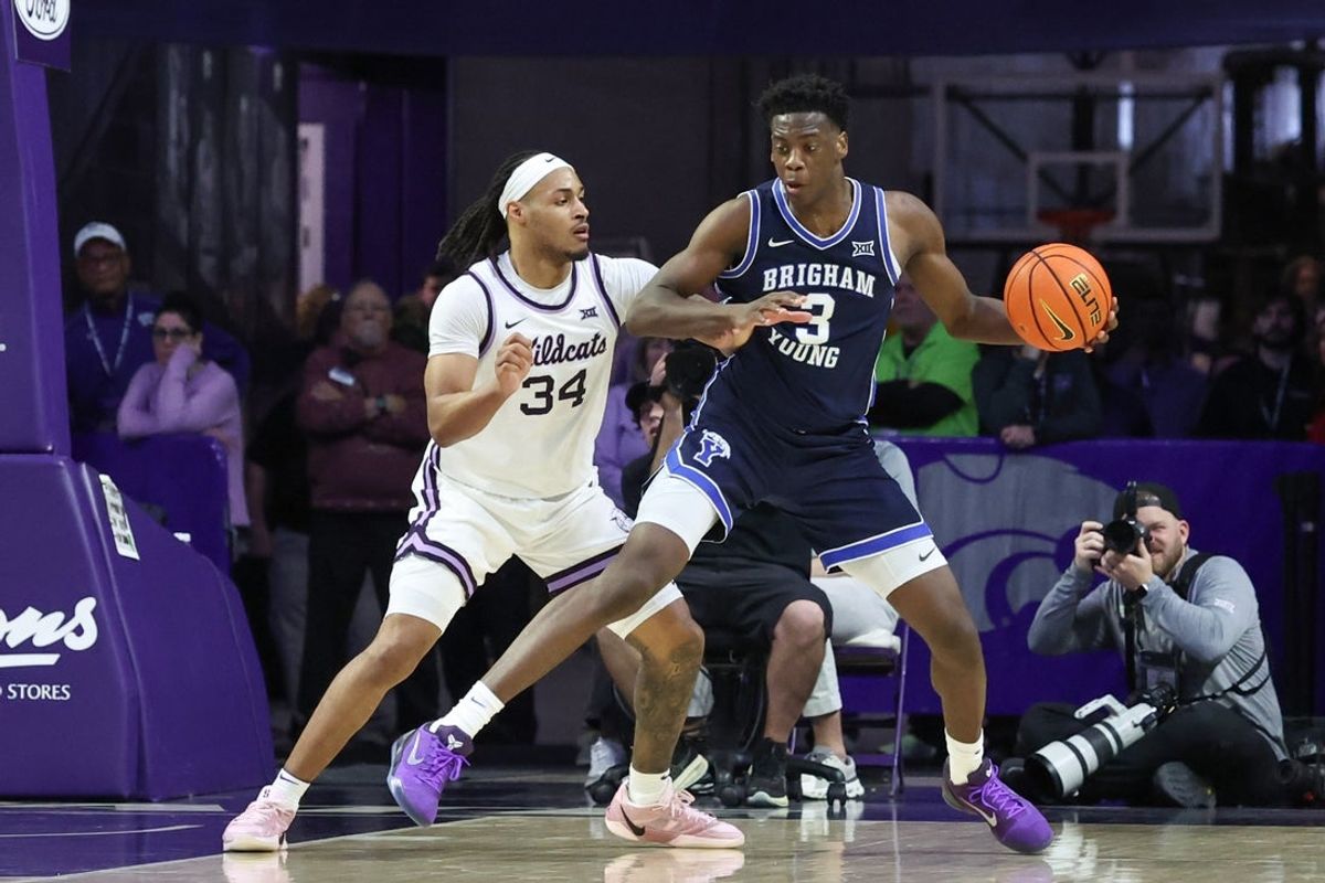 Jan 3, 2026; Manhattan, Kansas, USA; Brigham Young Cougars forward AJ Dybantsa (3) is guarded by Kansas State Wildcats guard Nate Johnson (34) during the second half at Bramlage Coliseum. Mandatory Credit: Scott Sewell-Imagn Images