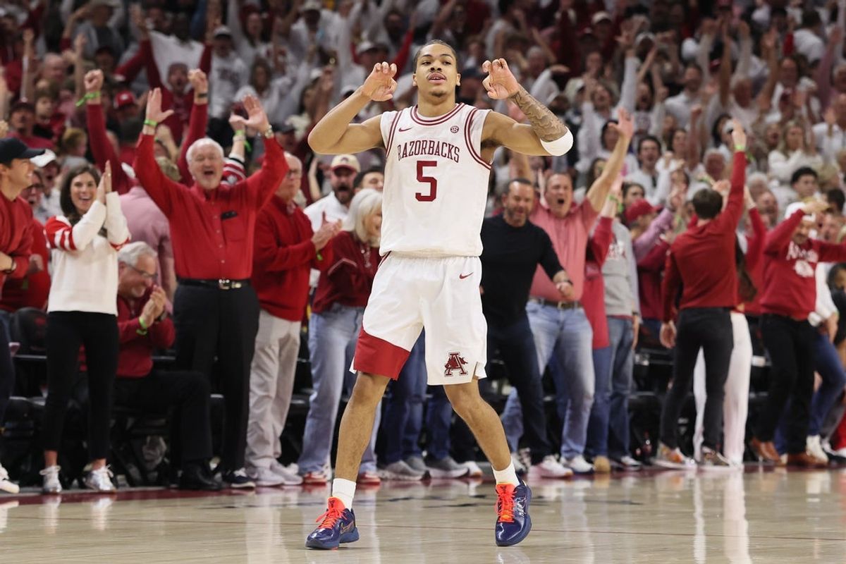 Jan 3, 2026; Fayetteville, Arkansas, USA; Arkansas Razorbacks guard Darius Acuff Jr (5) gestures after making a three point shot against the Tennessee Volunteers during the second half at Bud Walton Arena.  Mandatory Credit: Nelson Chenault-Imagn Images