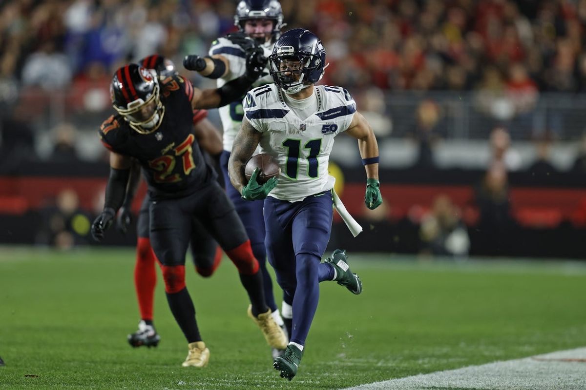 Jan 3, 2026; Santa Clara, California, USA; Seattle Seahawks wide receiver Jaxon Smith-Njigba (11) runs after a catch against the San Francisco 49ers during the first half at Levi's Stadium. Mandatory Credit: Sergio Estrada-Imagn Images