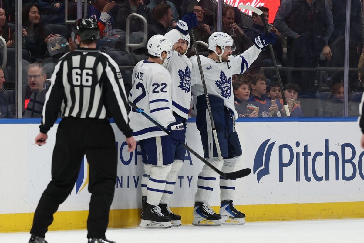 Jan 3, 2026; Elmont, New York, USA; Toronto Maple Leafs center Auston Matthews (34) celebrates after scoring a goal against the New York Islanders during the second period at UBS Arena. Mandatory Credit: Thomas Salus-Imagn Images