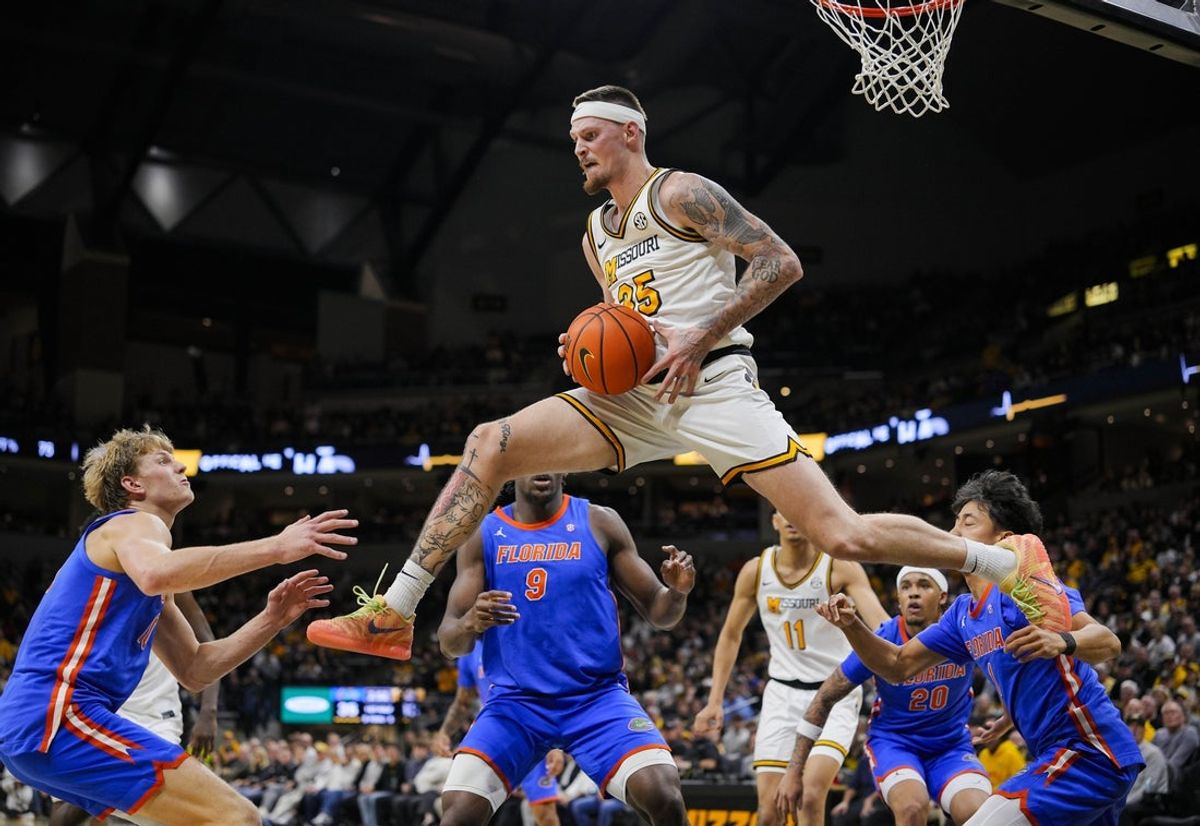 Jan 3, 2026; Columbia, Missouri, USA; Missouri Tigers guard Jacob Crews (35) grabs a rebound during the first half against the Missouri Tigers at Mizzou Arena. Mandatory Credit: Jay Biggerstaff-Imagn Images