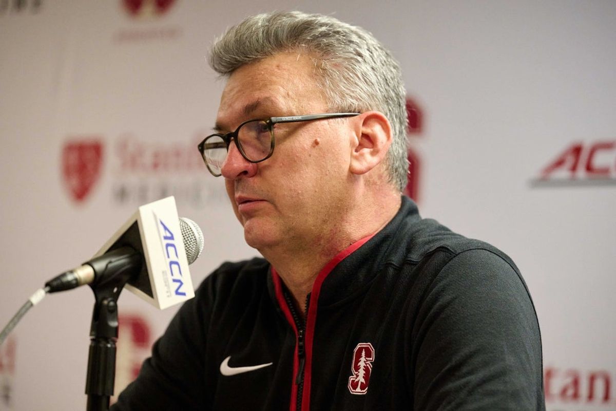 Dec 30, 2025; Stanford, California, USA; Stanford Cardinal head coach Kyle Smith speaks to the media after the game against the Notre Dame Fighting Irish at Maples Pavilion. Mandatory Credit: Robert Edwards-Imagn Images