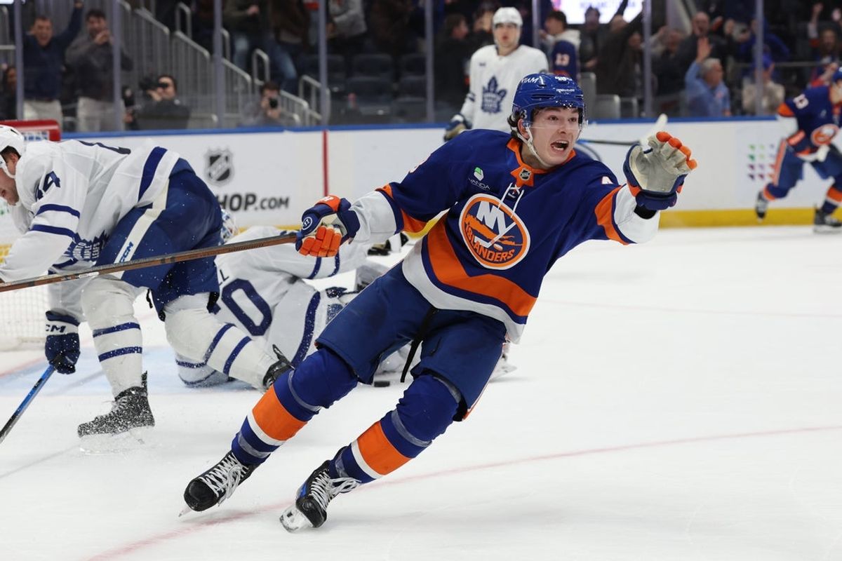 Jan 3, 2026; Elmont, New York, USA; New York Islanders defenseman Matthew Schaefer (48) celebrates after scoring the winning goal in overtime against the Toronto Maple Leafs at UBS Arena. Mandatory Credit: Thomas Salus-Imagn Images