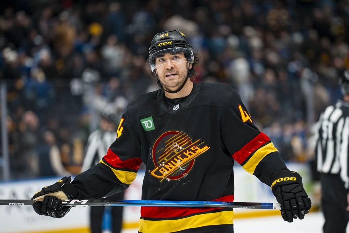 Jan 3, 2026; Vancouver, British Columbia, CAN; Vancouver Canucks forward Kiefer Sherwood (44) reacts to the loss against the Boston Bruins in overtime at Rogers Arena. Mandatory Credit: Bob Frid-Imagn Images