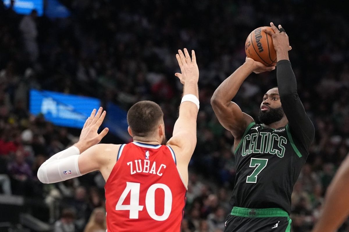 Jan 3, 2026; Inglewood, California, USA; Boston Celtics guard Jaylen Brown (7) shoots the ball against LA Clippers center Ivica Zubac (40) in the second half at Intuit Dome. Mandatory Credit: Kirby Lee-Imagn Images