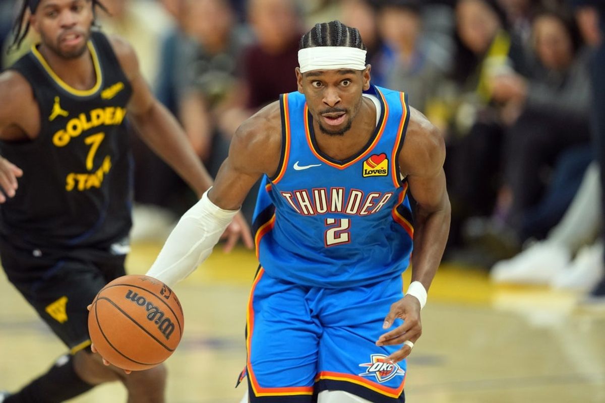 Jan 2, 2026; San Francisco, California, USA; Oklahoma City Thunder guard Shai Gilgeous-Alexander (2) dribbles against the Golden State Warriors during the third quarter at Chase Center. Mandatory Credit: Darren Yamashita-Imagn Images