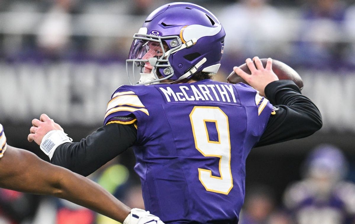 Jan 4, 2026; Minneapolis, Minnesota, USA; Minnesota Vikings quarterback J.J. McCarthy (9) throws a pass against the Green Bay Packers during the first quarter at U.S. Bank Stadium. Mandatory Credit: Jeffrey Becker-Imagn Images