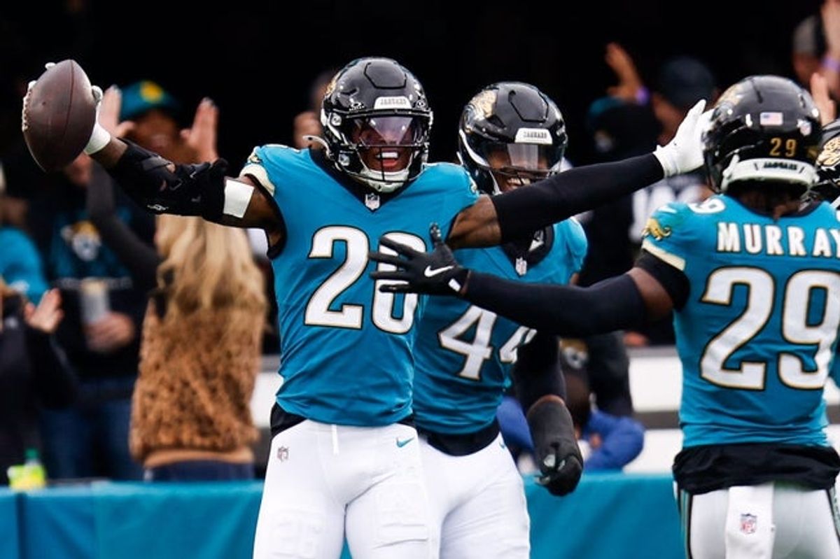 Jacksonville Jaguars safety Antonio Johnson (26) celebrates a pick six during the second quarter in an NFL football matchup at EverBank Stadium, Sunday, Jan. 4, 2026, in Jacksonville, Fla. [Doug Engle/Florida Times-Union]