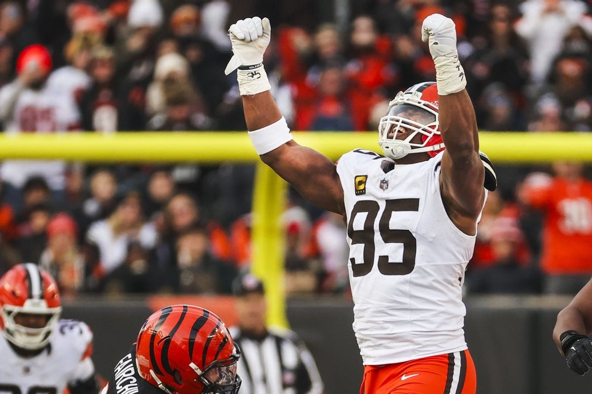 Jan 4, 2026; Cincinnati, Ohio, USA; Cleveland Browns defensive end Myles Garrett (95) celebrates following a sack against the Cincinnati Bengals during the fourth quarter at Paycor Stadium. The play set a new NFL single season sack record by Garrett. Mandatory Credit: Joseph Maiorana-Imagn Images