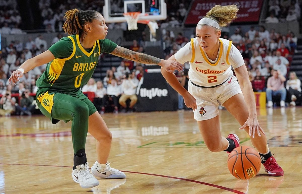 Iowa State Cyclones' guard Arianna Jackson (2) drives with the ball around Baylor Bears guard Taliah Scott (0) during the second quarter in the Big-12 women’s basketball on Jan. 4, 2026, at Hilton Coliseum in Ames, Iowa.