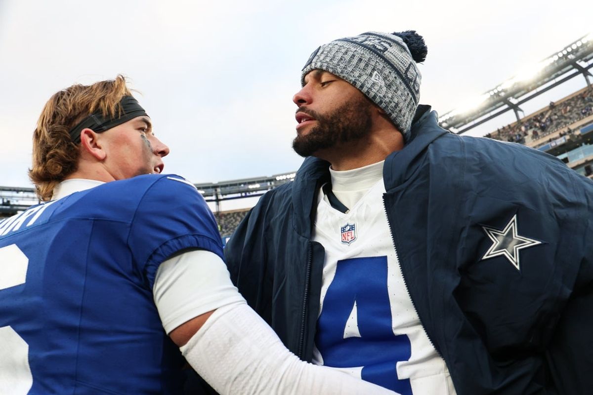 Jan 4, 2026; East Rutherford, New Jersey, USA; New York Giants quarterback Jaxson Dart (6) greets Dallas Cowboys quarterback Dak Prescott (4) on the field after the game at MetLife Stadium. Mandatory Credit: Vincent Carchietta-Imagn Images