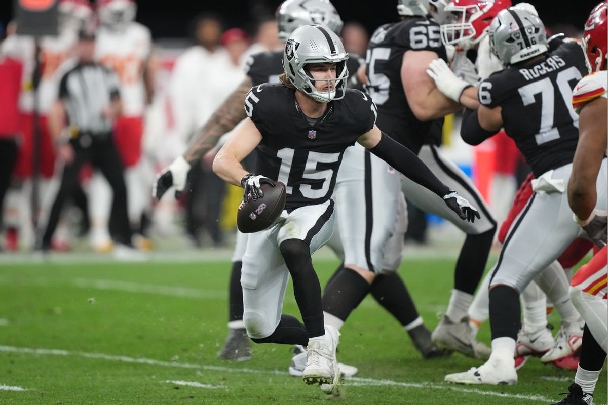 Jan 4, 2026; Paradise, Nevada, USA; Las Vegas Raiders quarterback Kenny Pickett (15) throws the ball against the Kansas City Chiefs in the first half at Allegiant Stadium. Mandatory Credit: Kirby Lee-Imagn Images