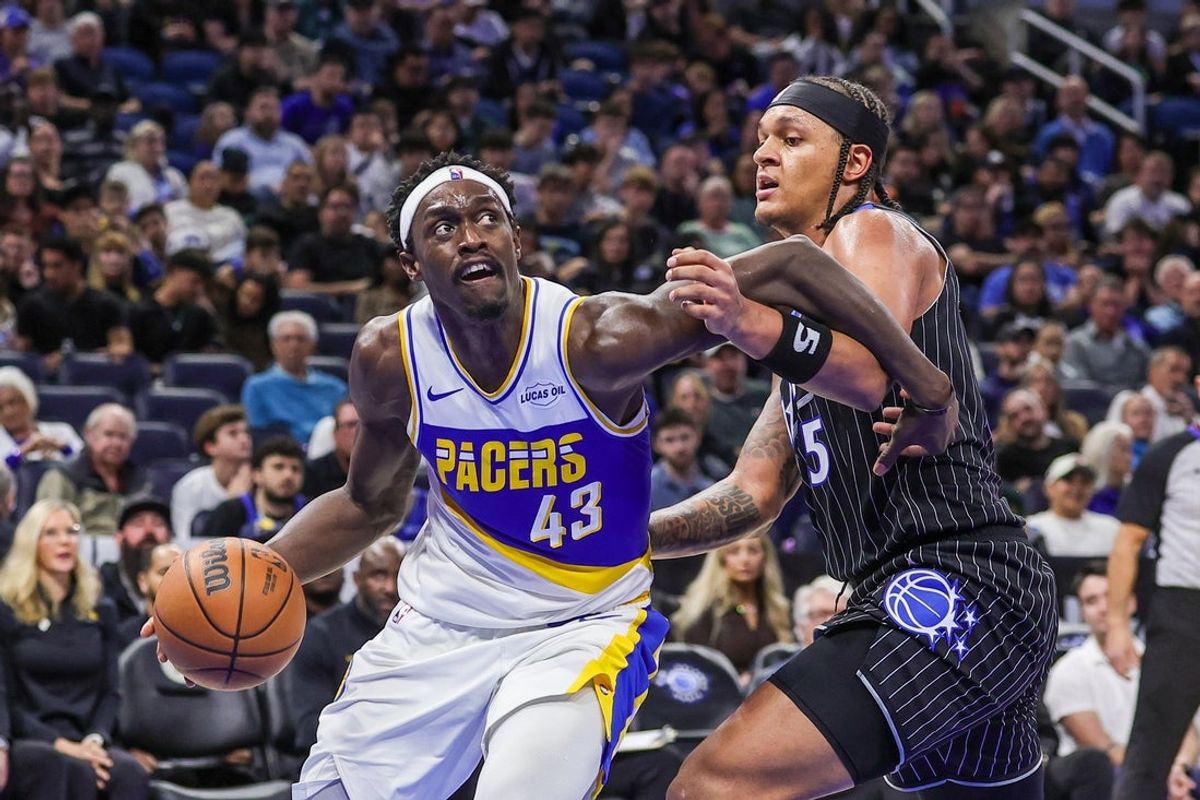 Jan 4, 2026; Orlando, Florida, USA; Indiana Pacers forward Pascal Siakam (43) drives to the basket against Orlando Magic forward Paolo Banchero (5) during the second half at Kia Center. Mandatory Credit: Mike Watters-Imagn Images